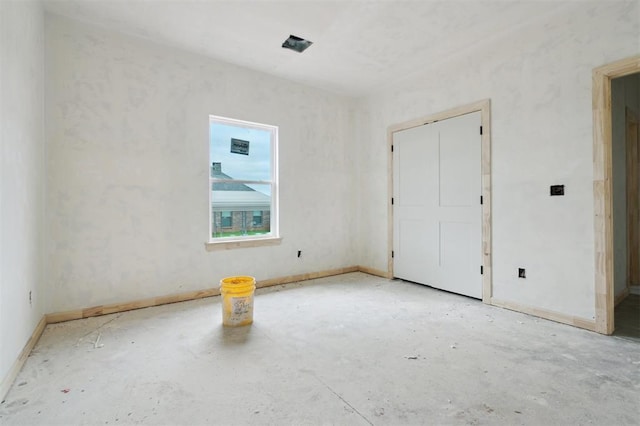 41364 Hazel Dell Rd, Shawnee, OK 74804 - unfurnished bedroom with baseboards and unfinished concrete flooring