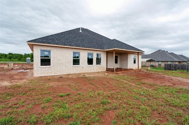 41364 Hazel Dell Rd, Shawnee, OK 74804 - rear view of house with brick siding and roof with shingles