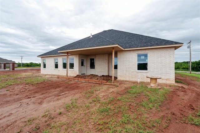 41364 Hazel Dell Rd, Shawnee, OK 74804 - rear view of house with roof with shingles and brick siding