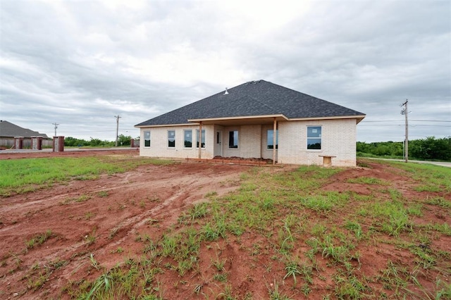 41364 Hazel Dell Rd, Shawnee, OK 74804 - back of property with brick siding and a shingled roof