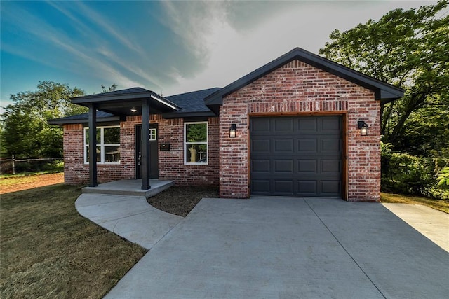 1417 Mallard Dr, Del City, OK 73115 - ranch-style house featuring driveway, brick siding, an attached garage, and a front lawn