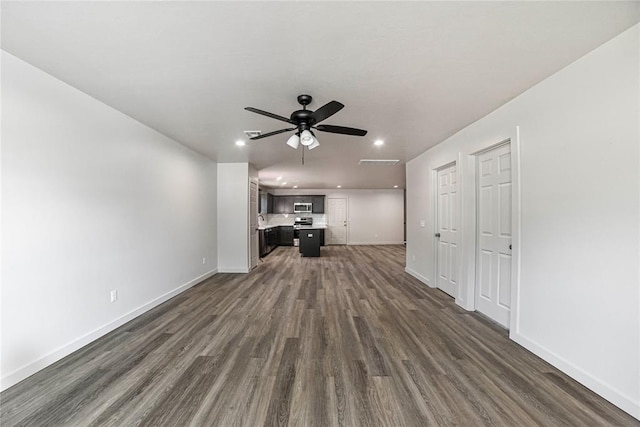 1417 Mallard Dr, Del City, OK 73115 - unfurnished living room featuring dark wood-style floors, recessed lighting, and ceiling fan