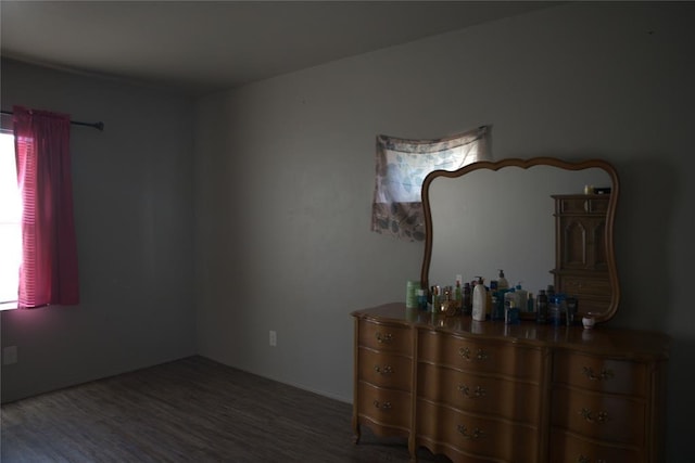 9008 N Walker Ave, Oklahoma City, OK 73103 - bedroom with multiple windows and wood finished floors