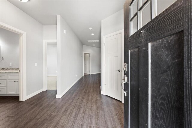 641 Geneva Dr, Edmond, OK 73025 - foyer entrance with dark wood-style floors and recessed lighting