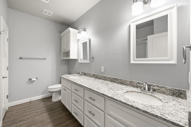 641 Geneva Dr, Edmond, OK 73025 - full bath featuring wood finished floors and double vanity