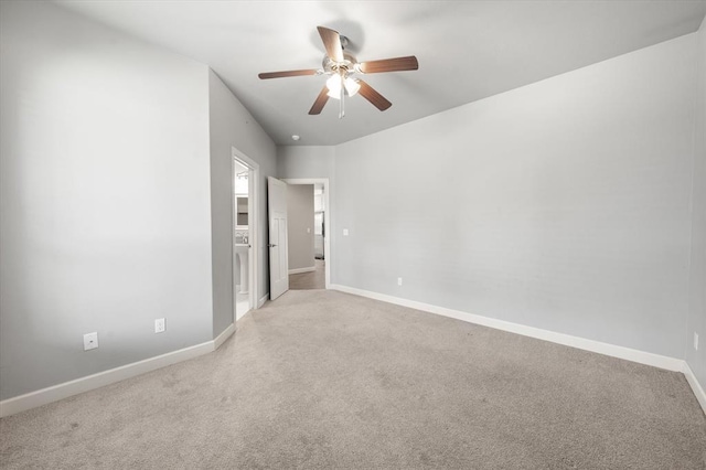 641 Geneva Dr, Edmond, OK 73025 - carpeted spare room featuring a ceiling fan and baseboards