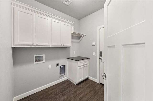 641 Geneva Dr, Edmond, OK 73025 - washroom with cabinet space, washer hookup, electric dryer hookup, and dark wood-style floors