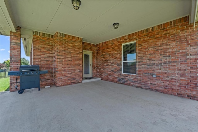 641 Geneva Dr, Edmond, OK 73025 - view of patio with a grill