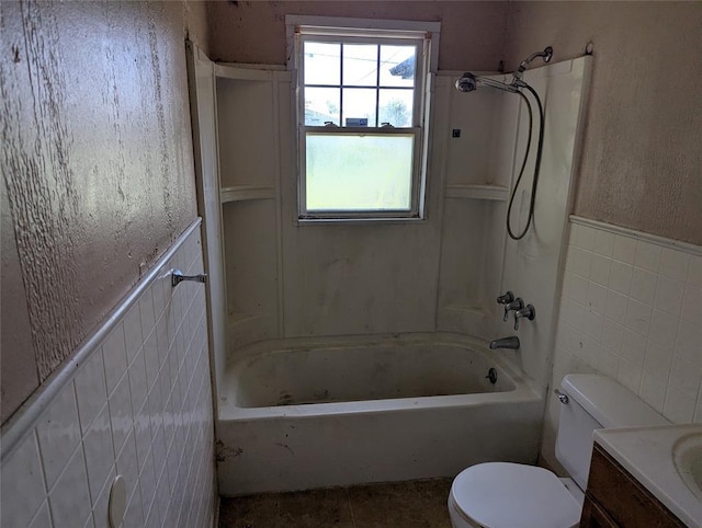1516 SW 44th St, Oklahoma City, OK 73119 - full bath featuring vanity, bathing tub / shower combination, wainscoting, and tile walls