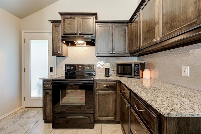 1109 Hickory Creek Dr, Yukon, OK 73099 - kitchen with stainless steel microwave, black range with electric stovetop, under cabinet range hood, dark brown cabinets, and light stone counters