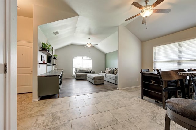1109 Hickory Creek Dr, Yukon, OK 73099 - living room featuring a ceiling fan and lofted ceiling