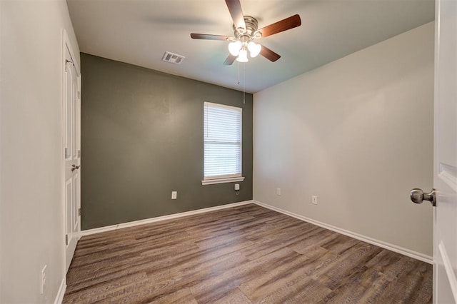 1109 Hickory Creek Dr, Yukon, OK 73099 - unfurnished room with wood finished floors and a ceiling fan