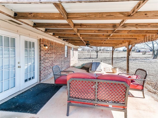2349 Fox Ln, Blanchard, OK 73010 - view of patio / terrace featuring french doors
