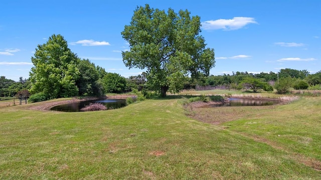 2349 Fox Ln, Blanchard, OK 73010 - view of grassy yard featuring a water view
