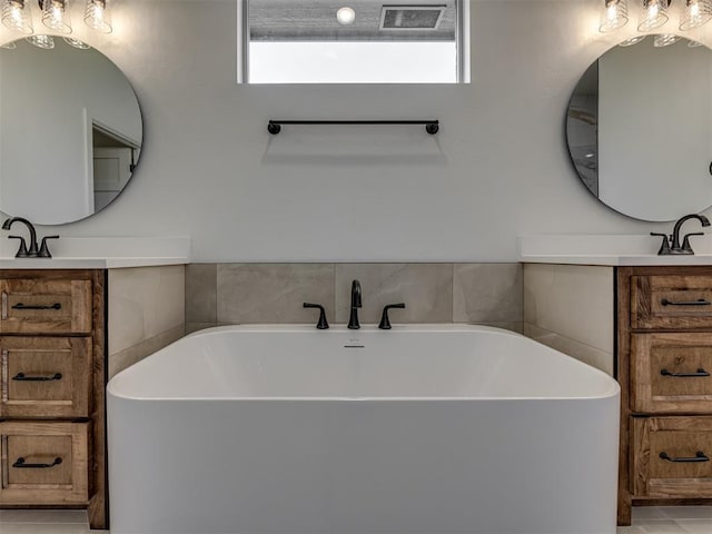 7625 Leoma Ln, Oklahoma City, OK 73150 - full bathroom featuring vanity and a freestanding tub