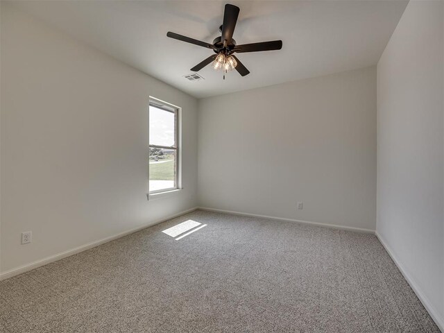 7625 Leoma Ln, Oklahoma City, OK 73150 - carpeted empty room featuring a ceiling fan and baseboards