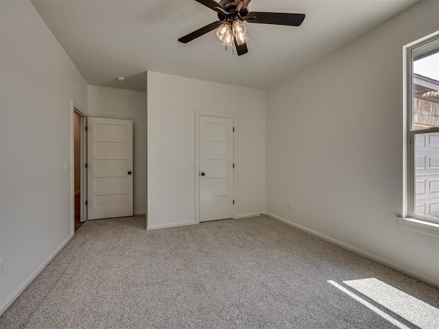 7625 Leoma Ln, Oklahoma City, OK 73150 - unfurnished bedroom featuring light carpet and a ceiling fan