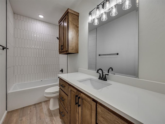 7625 Leoma Ln, Oklahoma City, OK 73150 - bathroom featuring vanity, wood finished floors, shower / washtub combination, and recessed lighting