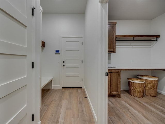 7625 Leoma Ln, Oklahoma City, OK 73150 - mudroom featuring light wood-style floors and baseboards