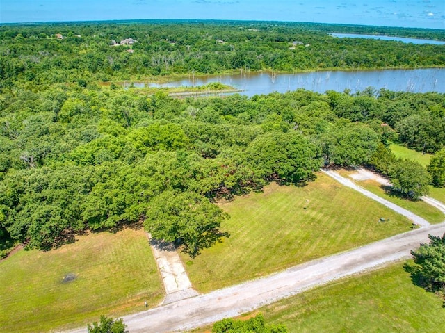 114 Timber Ln, Mcloud, OK 74851 - drone / aerial view of a heavily wooded area and a large body of water