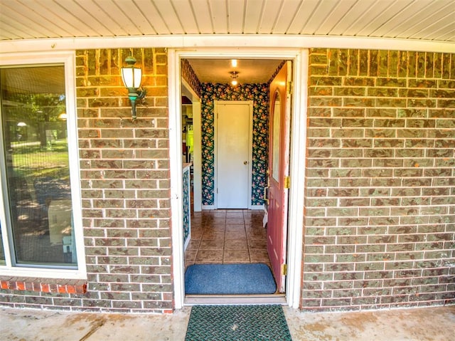 114 Timber Ln, Mcloud, OK 74851 - view of exterior entry featuring brick siding