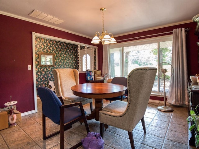 114 Timber Ln, Mcloud, OK 74851 - dining space featuring a chandelier and ornamental molding