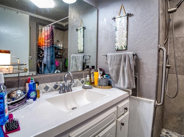 114 Timber Ln, Mcloud, OK 74851 - full bathroom with tiled shower, vanity, and a textured wall