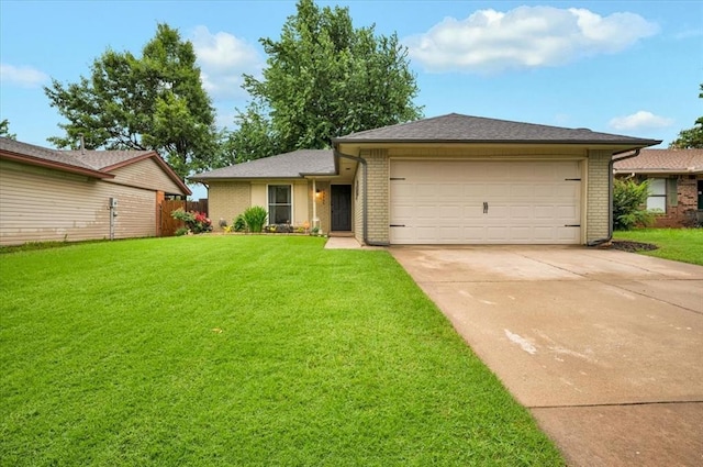 12414 SW 15th Ter, Yukon, OK 73099 - single story home featuring driveway, an attached garage, a front yard, and brick siding