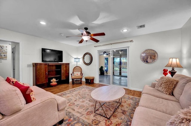 12414 SW 15th Ter, Yukon, OK 73099 - living room featuring ceiling fan, wood finished floors, and recessed lighting