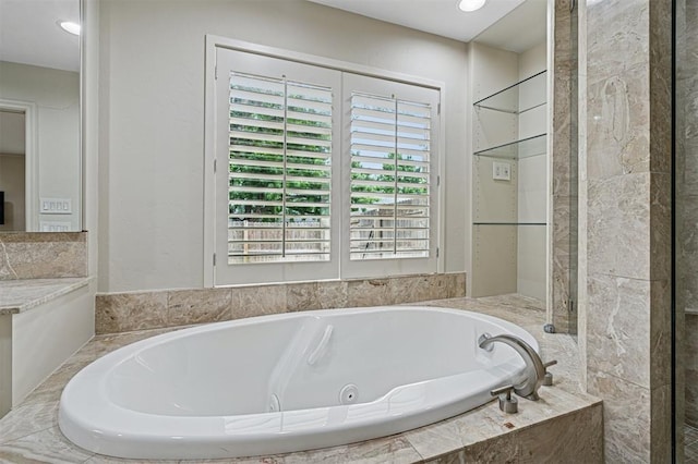 11209 Thorn Ridge Rd, Oklahoma City, OK 73120 - bathroom featuring a whirlpool tub and recessed lighting