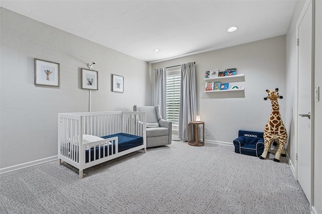 11209 Thorn Ridge Rd, Oklahoma City, OK 73120 - carpeted bedroom featuring a nursery area and baseboards