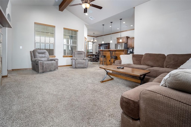 6813 Chelsey Ln, Oklahoma City, OK 73132 - living area featuring high vaulted ceiling, beamed ceiling, ceiling fan, a chandelier, and light colored carpet