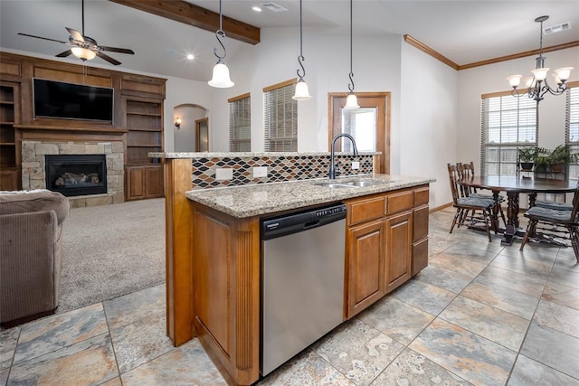 6813 Chelsey Ln, Oklahoma City, OK 73132 - kitchen featuring stainless steel dishwasher, open floor plan, ceiling fan, light stone countertops, and backsplash
