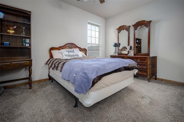6813 Chelsey Ln, Oklahoma City, OK 73132 - carpeted bedroom featuring baseboards and a ceiling fan
