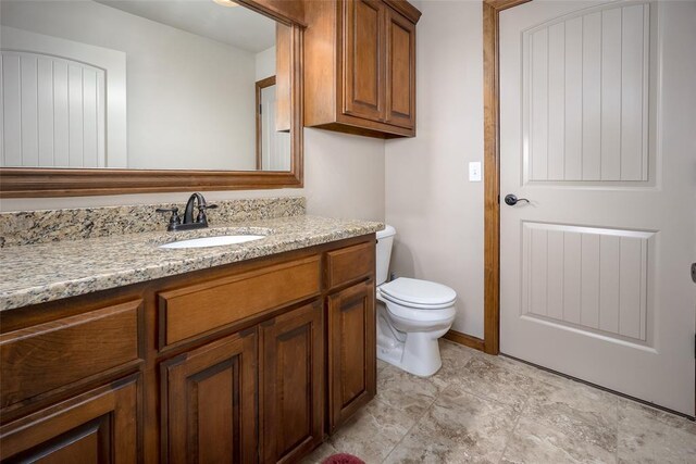 6813 Chelsey Ln, Oklahoma City, OK 73132 - bathroom with vanity and toilet