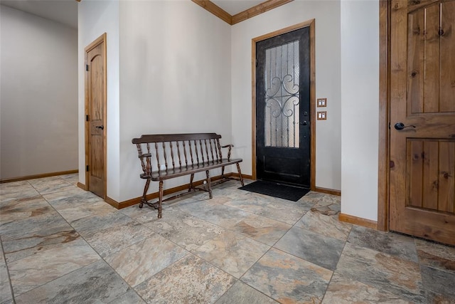 6813 Chelsey Ln, Oklahoma City, OK 73132 - foyer featuring light stone finish floors and ornamental molding