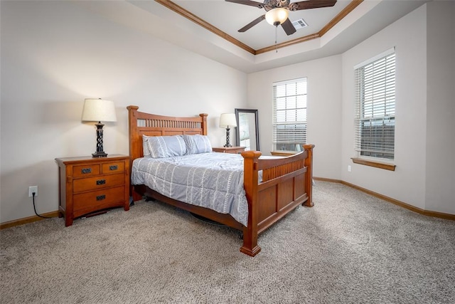 6813 Chelsey Ln, Oklahoma City, OK 73132 - bedroom with a raised ceiling, ornamental molding, light colored carpet, and a ceiling fan