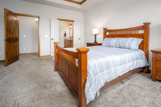 6813 Chelsey Ln, Oklahoma City, OK 73132 - bedroom with light colored carpet and connected bathroom