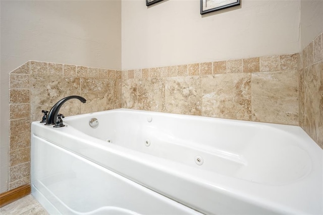 6813 Chelsey Ln, Oklahoma City, OK 73132 - bathroom with a tub with jets