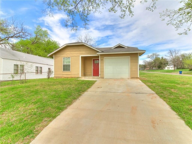 524 E Grant Ave, Guthrie, OK 73044 - view of front of home with an attached garage and concrete driveway