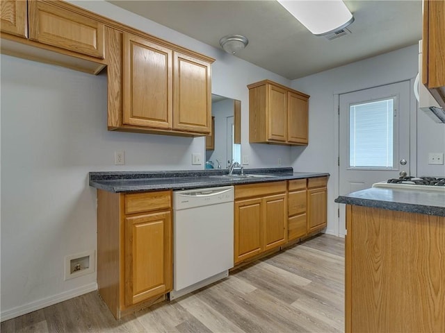 524 E Grant Ave, Guthrie, OK 73044 - kitchen featuring white dishwasher, dark countertops, and light wood-type flooring