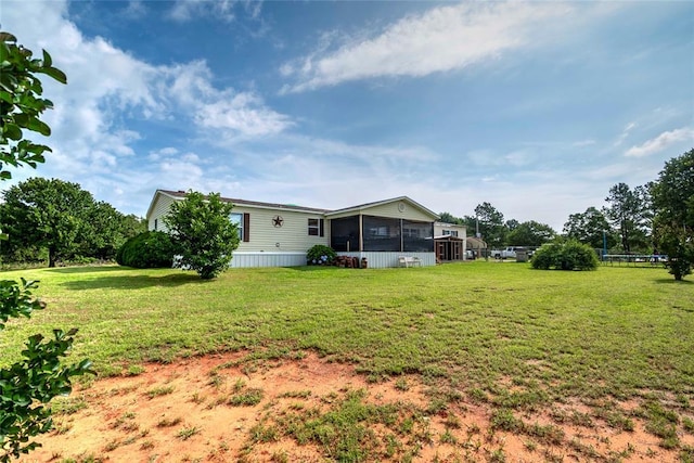 910903 S 3444th Rd, Chandler, OK 74834 - view of grassy yard with a sunroom