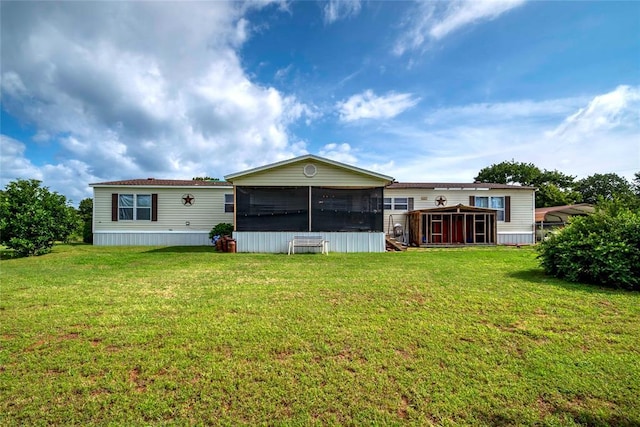 910903 S 3444th Rd, Chandler, OK 74834 - back of house featuring a sunroom and a yard