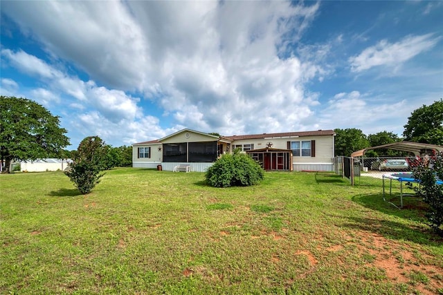910903 S 3444th Rd, Chandler, OK 74834 - back of house featuring a sunroom and a detached carport