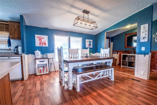 910903 S 3444th Rd, Chandler, OK 74834 - dining area featuring wood finished floors and a textured ceiling