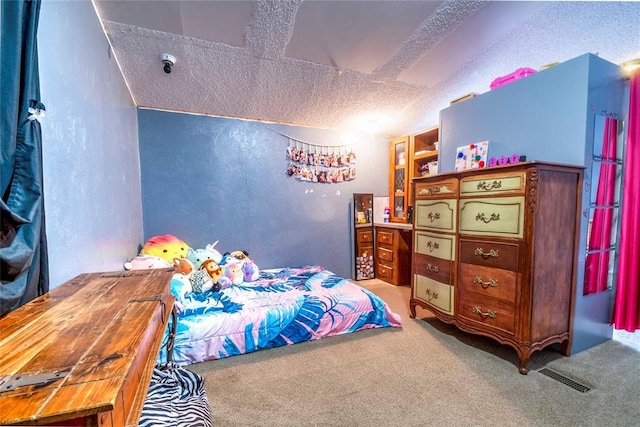 910903 S 3444th Rd, Chandler, OK 74834 - bedroom featuring a textured wall, carpet floors, and a textured ceiling