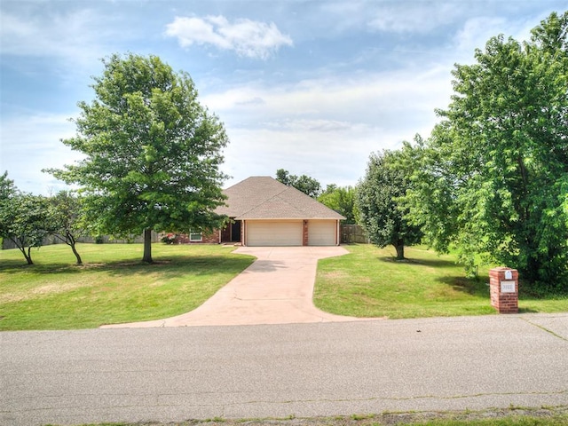 3922 Deer Xing, Edmond, OK 73025 - view of front of house featuring driveway, an attached garage, a front yard, and brick siding