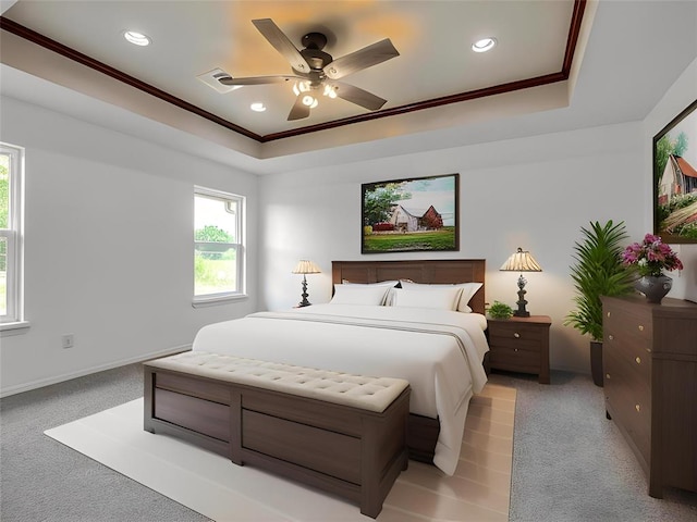 3922 Deer Xing, Edmond, OK 73025 - bedroom with a tray ceiling, ornamental molding, light colored carpet, recessed lighting, and a ceiling fan