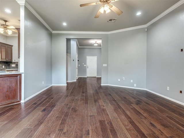 3922 Deer Xing, Edmond, OK 73025 - unfurnished living room with ceiling fan, dark wood finished floors, ornamental molding, and recessed lighting