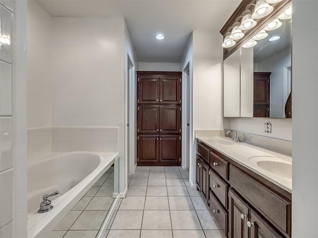3922 Deer Xing, Edmond, OK 73025 - bathroom featuring tile patterned flooring, double vanity, and a bath